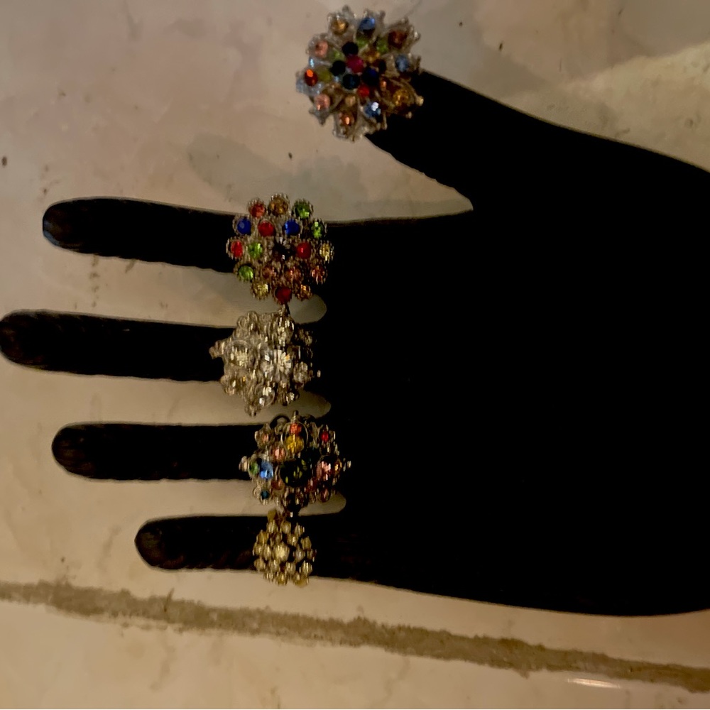 5 rings with different beads and diamonds
